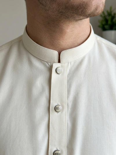 Man wearing ivory kurta shalwar with mandarin collar – Riwayat menswear
