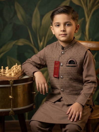 Al Fajar boys brown quilted waistcoat with textured dot weave and embroidered mandarin collar, paired with matching kurta shalwar, formal kids ethnic wear.